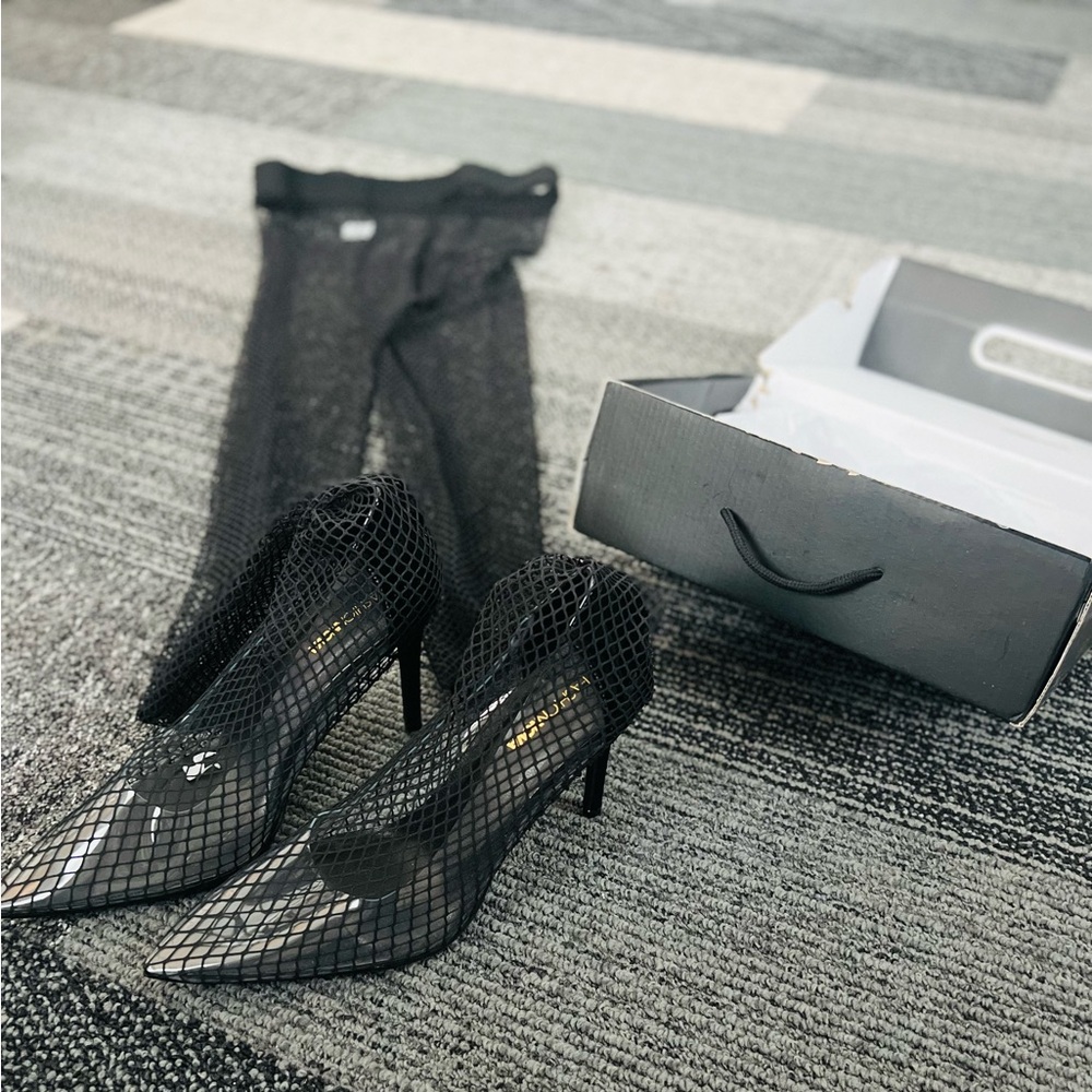 Sexy fishnet stockings with stiletto attached. Show stoppers.